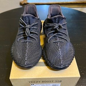 Black 350 Yeezy with reflective laces